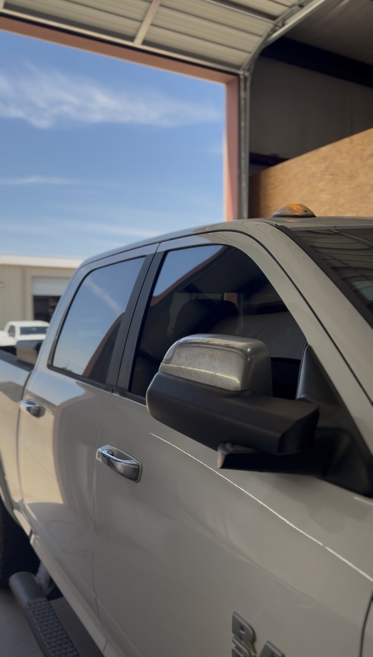 Silver Ram truck with tinted windows