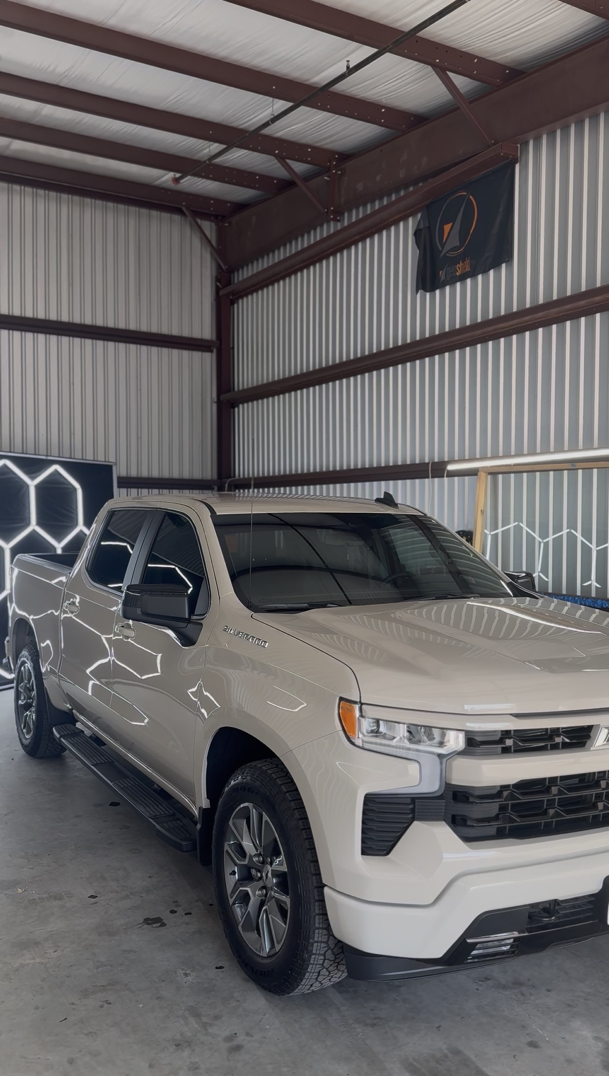 White Chevrolet Silverado with fresh tinted windows