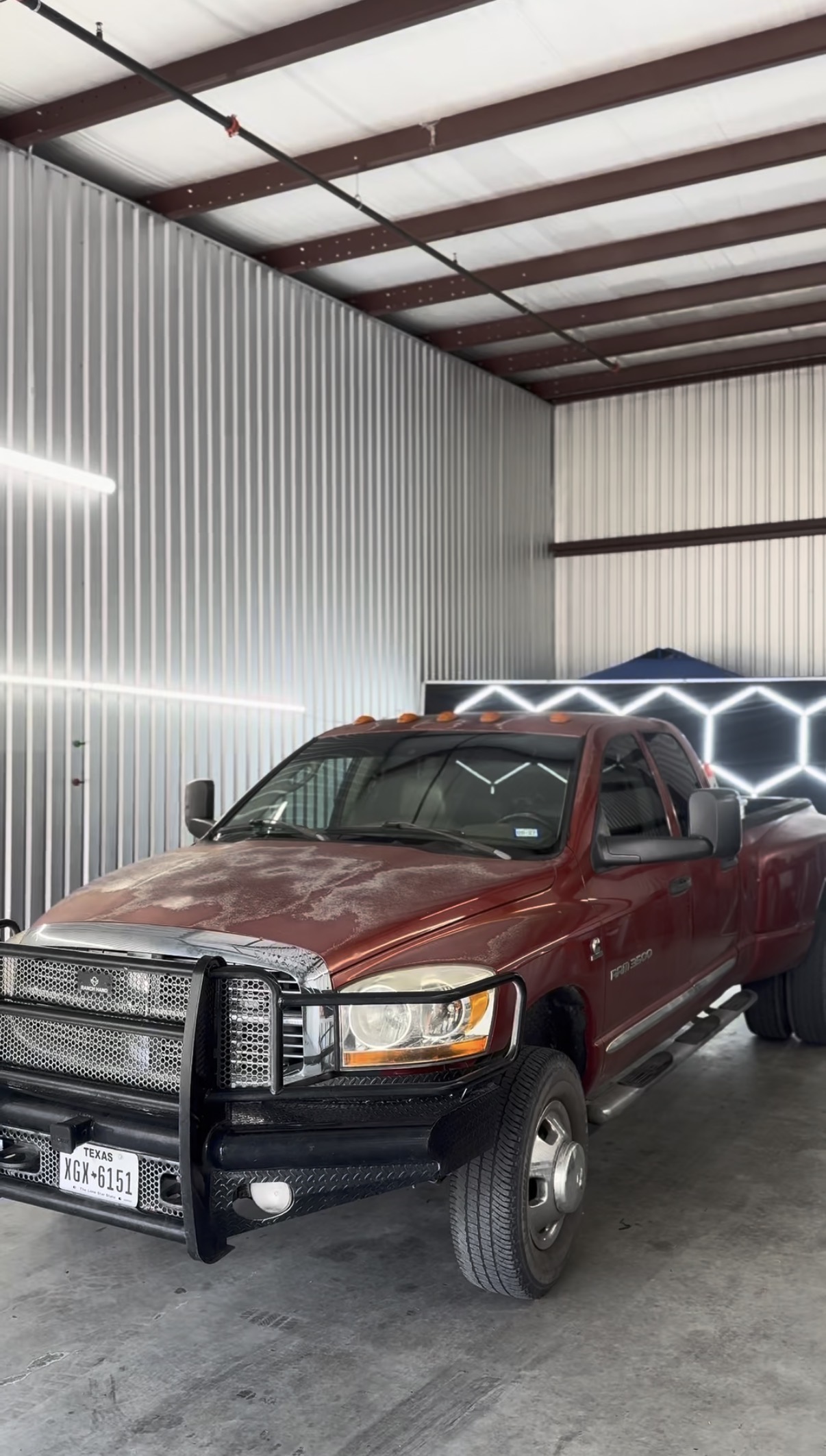 Red Ram work truck with tinted windshield
