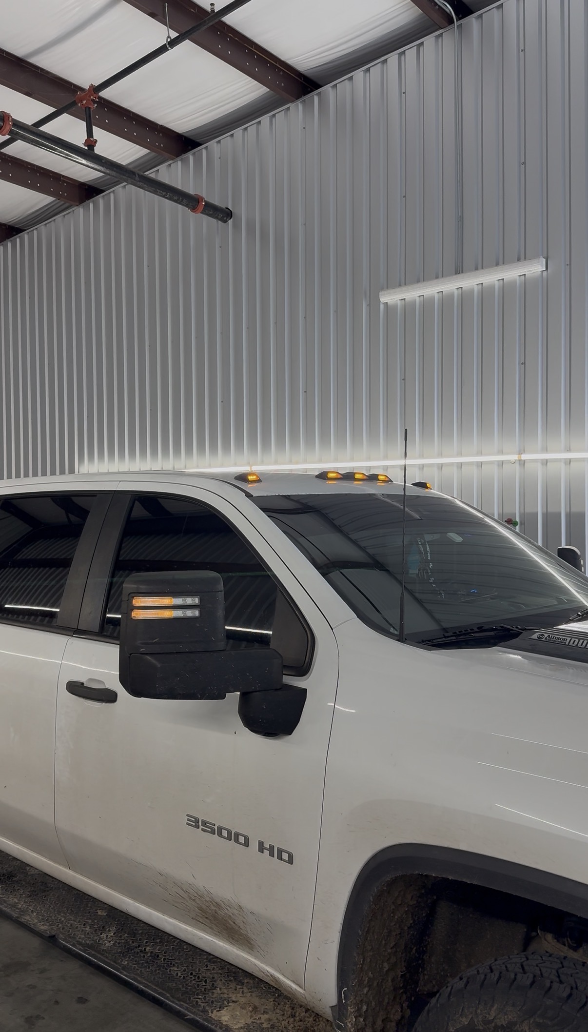 White Chevrolet Silverado 3500 HD with tinted windows